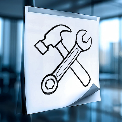 Post-it paper showing hand drawn tools symbol of advisory services